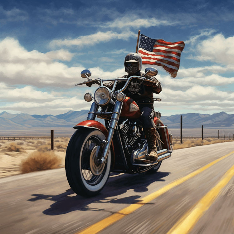 Motorcycle driving down the desert highway with an American flag waving behind him