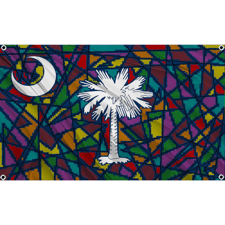 Stained glass window with white palm tree and white crescent moon